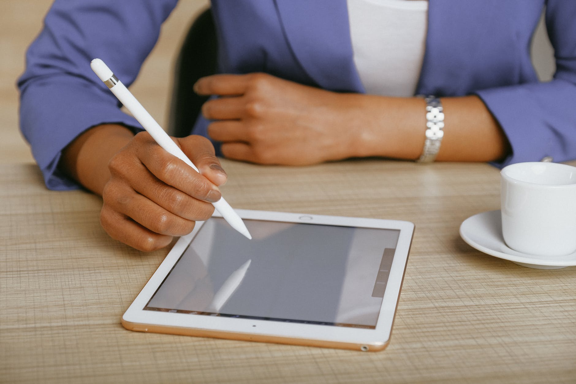 close up of woman using digital tablet